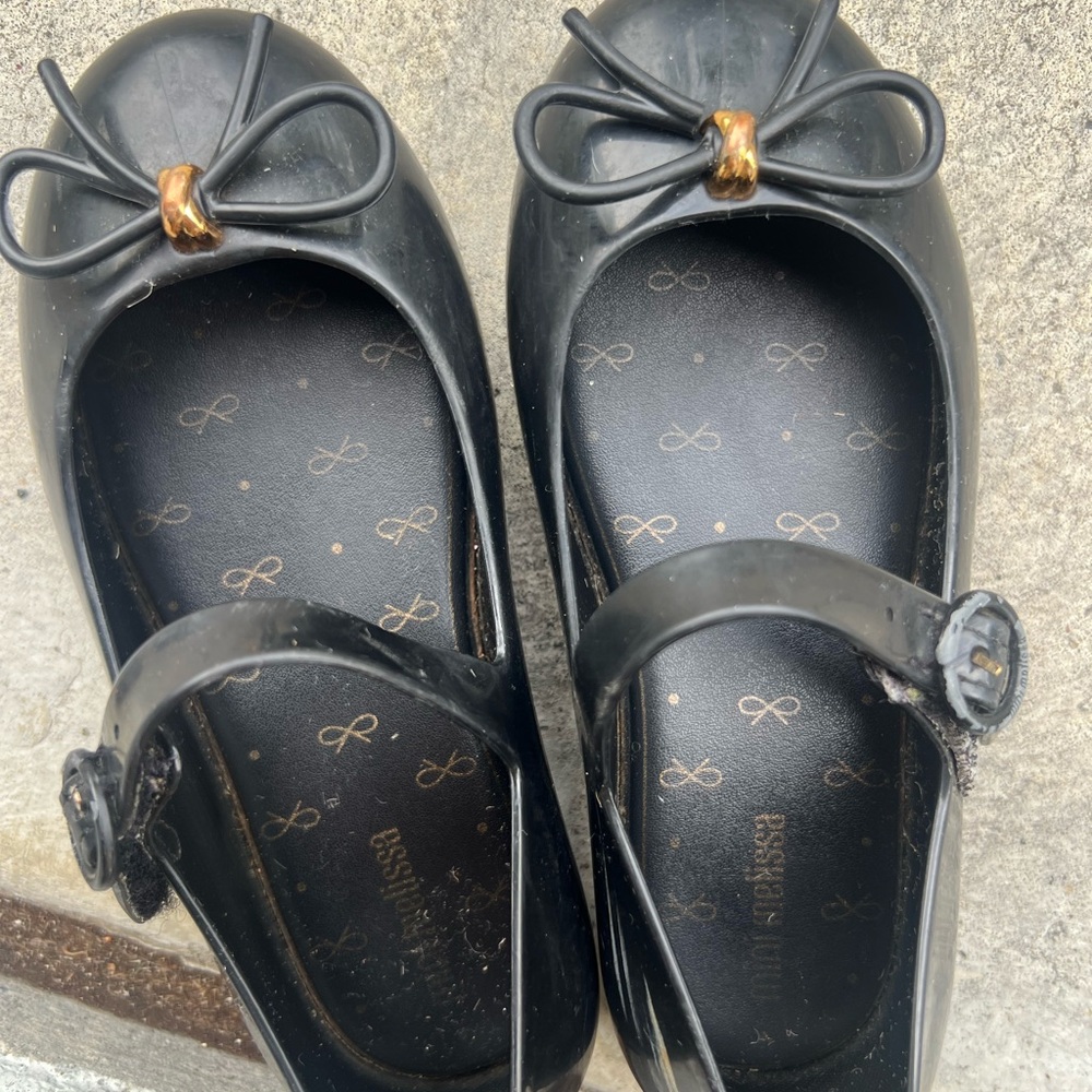 Mini Melissa Black Loafers with Bow and Gold Accent